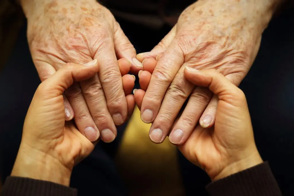Compassion hand holding